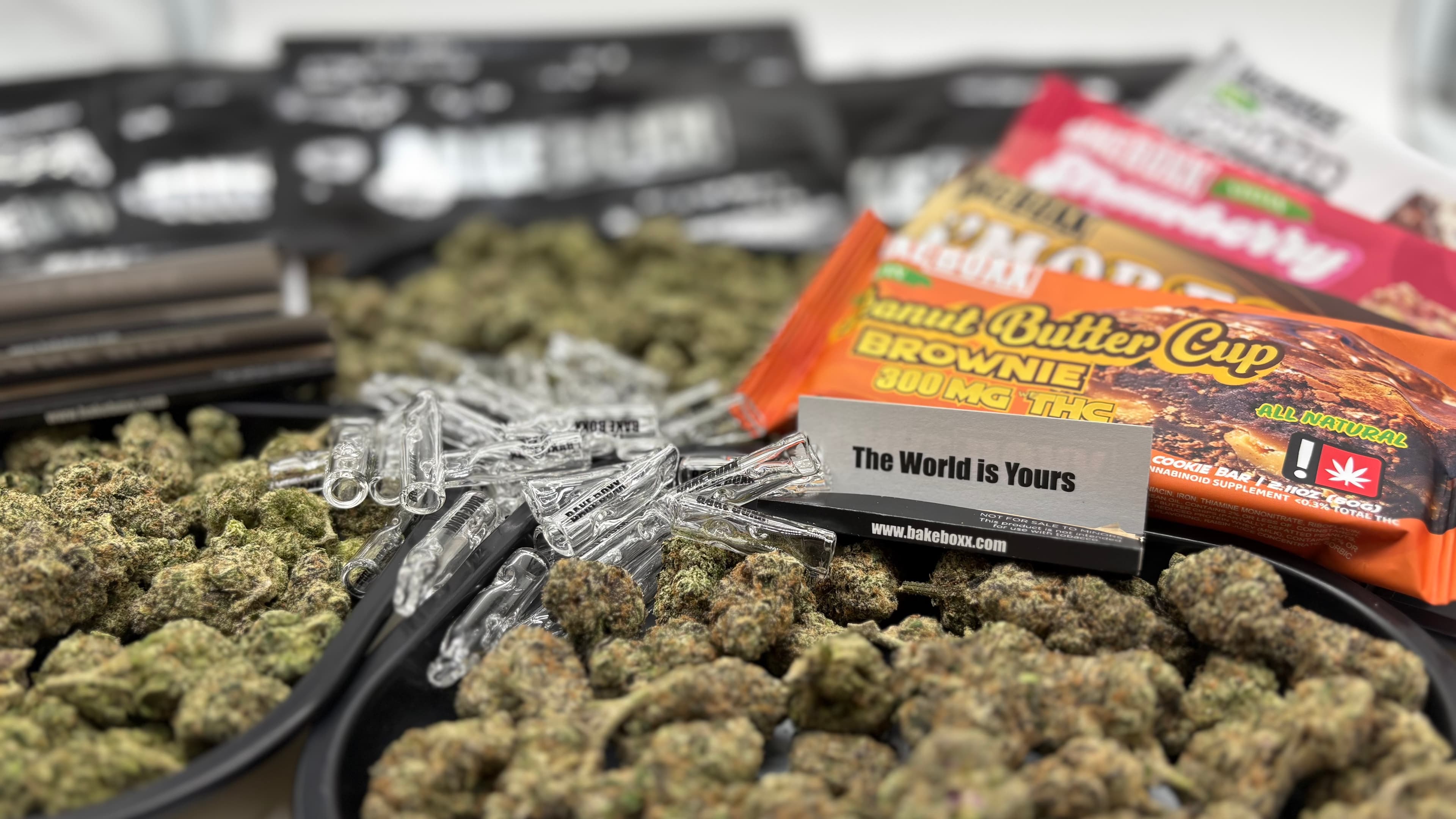 A collection of premium THCA flower buds and branded containers
